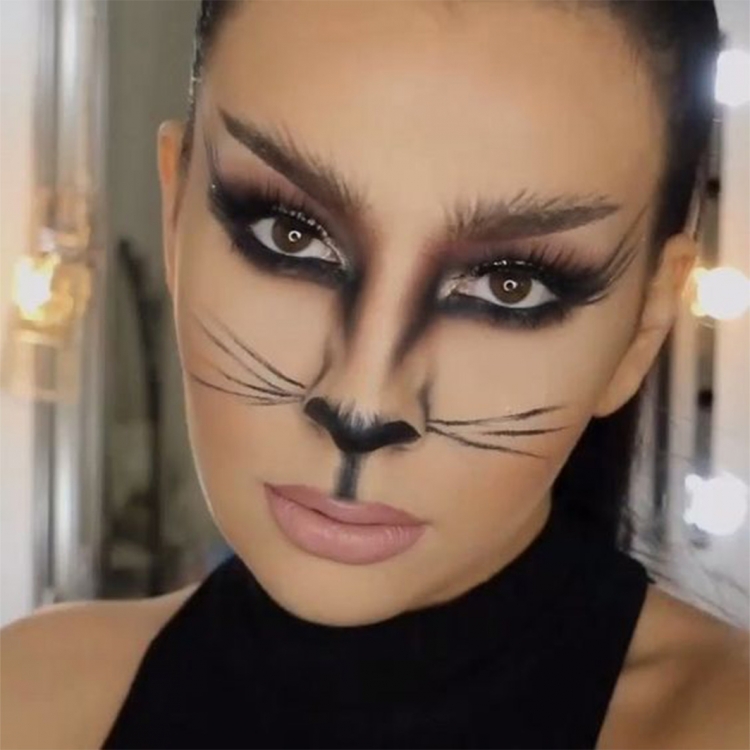 Женщина кошка Гримм