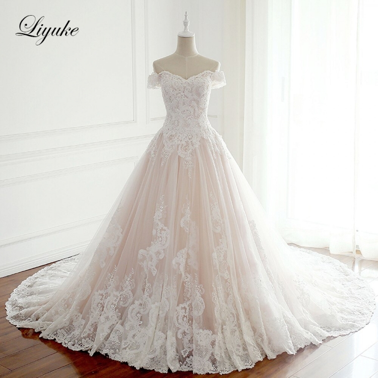 Свадебные платья Queen Bridal